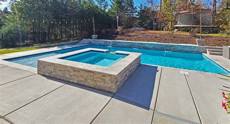 concrete pool builders near me.